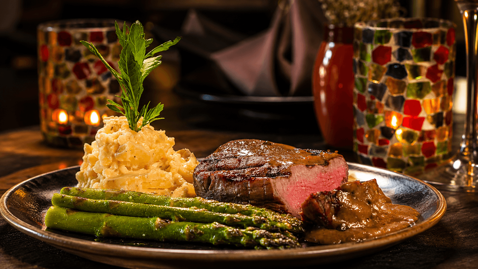 Texas Filet with mashed potatoes, asparagus, and port mushroom sauce